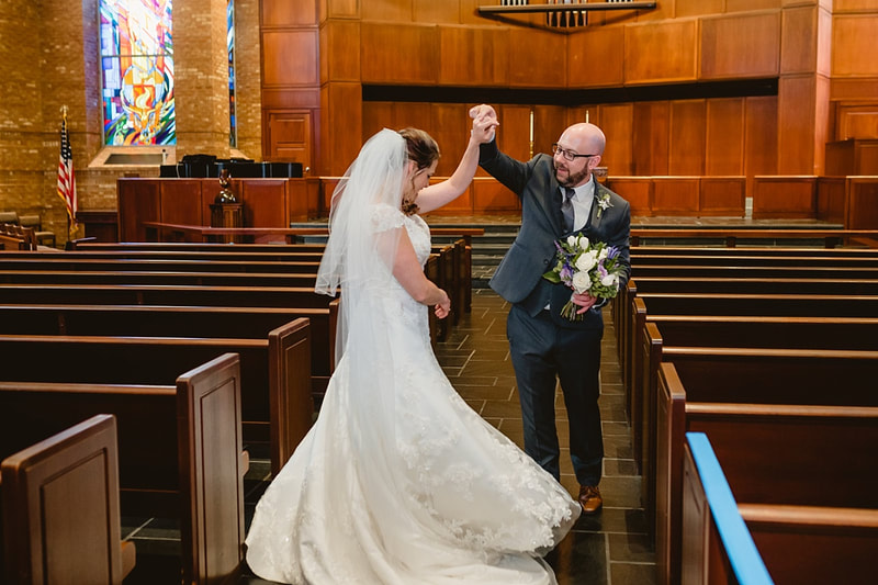 Bride and groom dancing in the church aisle + Memphis, TN wedding