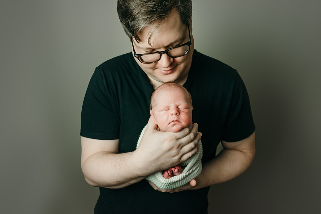 newborn baby with dad for newborn photos in Memphis, TN