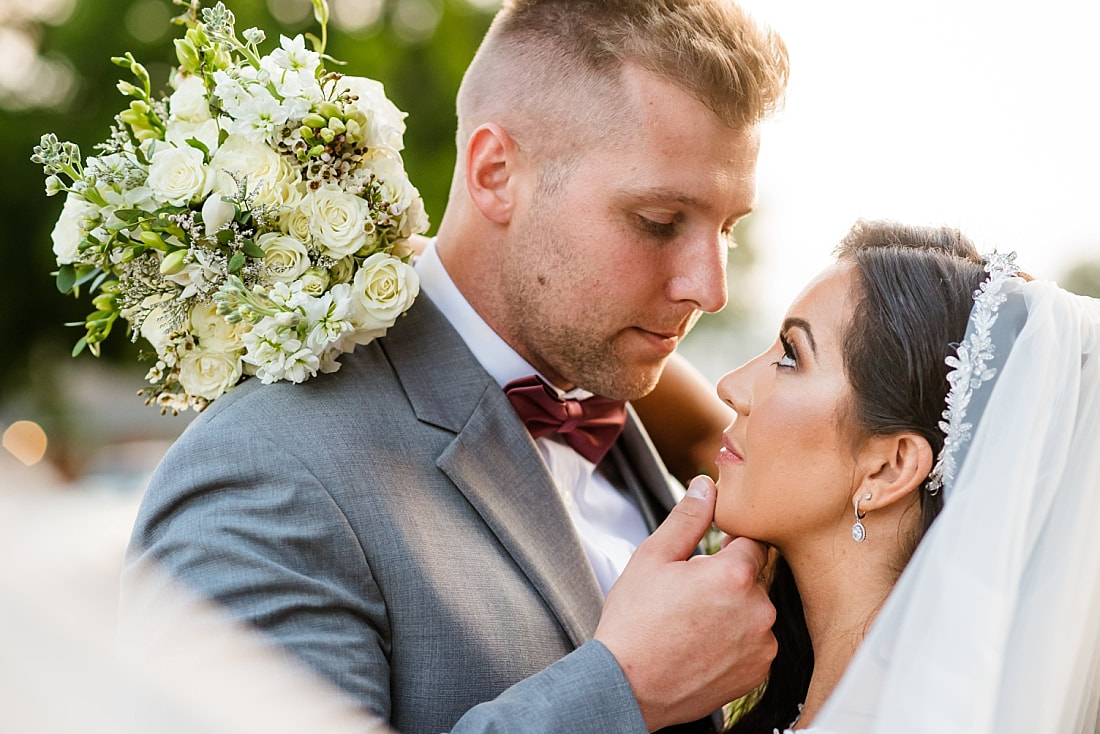 bride and groom gazing into each other's eyes at The Gin in Nesbit, MS